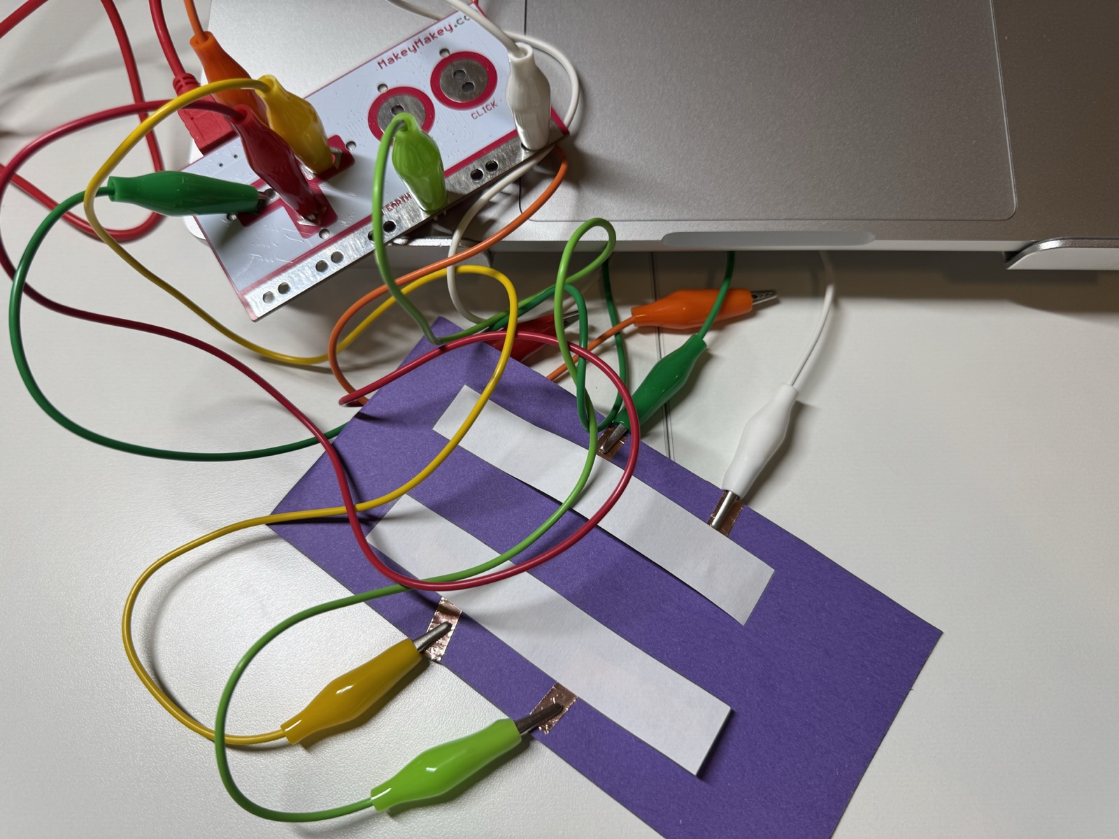 In this attempt, I changed the conductive strips into a more direct parallel layout.